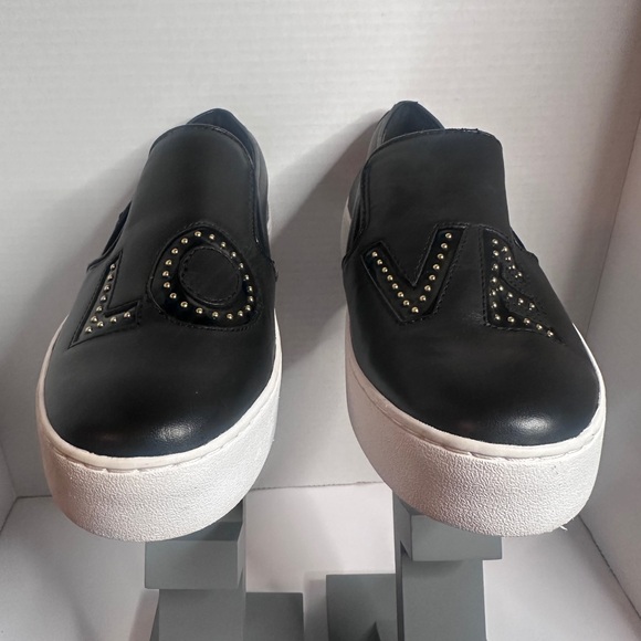 MICHAEL Michael Kors Black Slip-On Shoes with Gold Accents - Picture 3 of 7